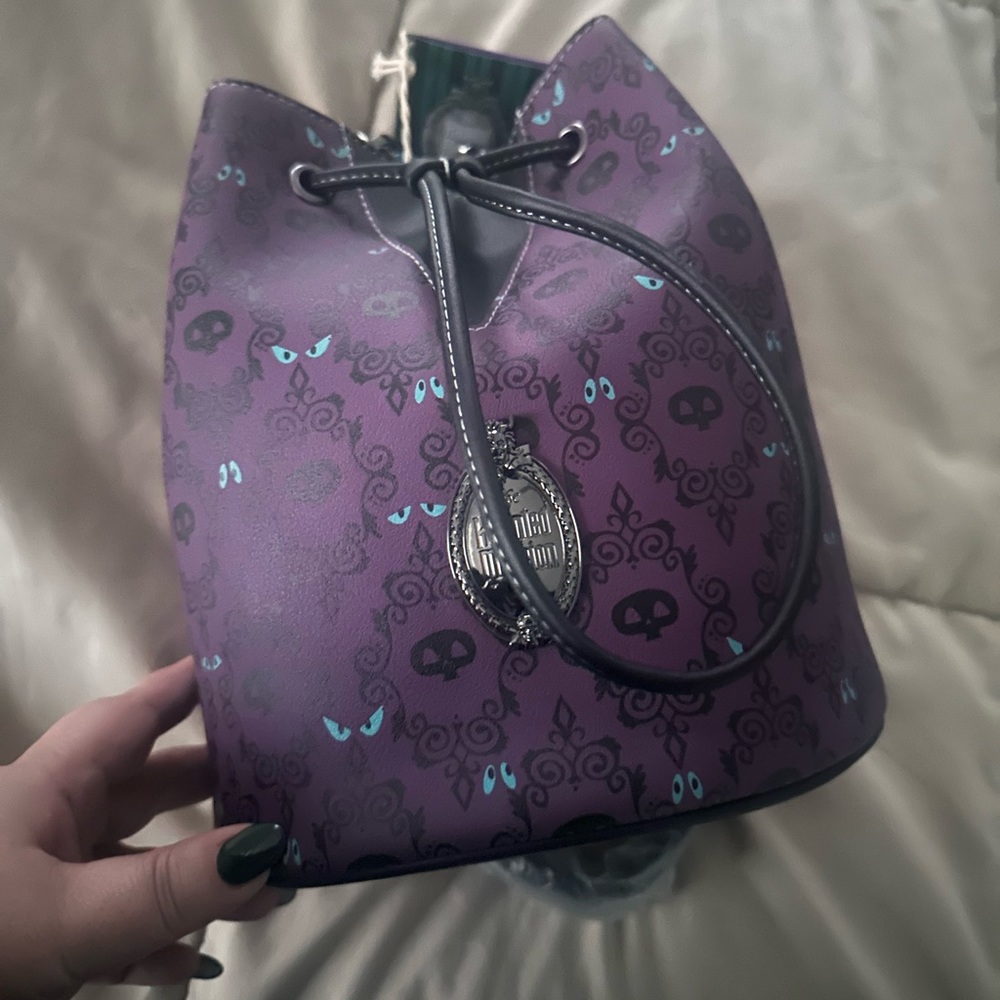 New with tags Loungefly Haunted Mansion Bucket bag.